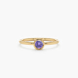 yellow gold purple gemstone
