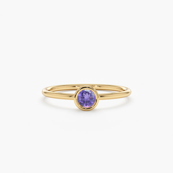 yellow gold purple gemstone