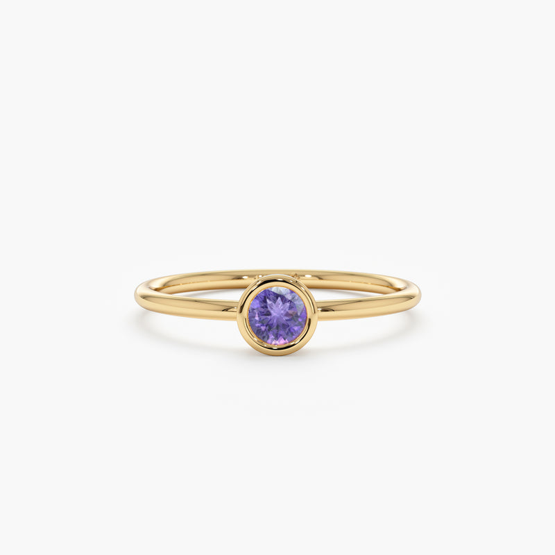 yellow gold purple gemstone