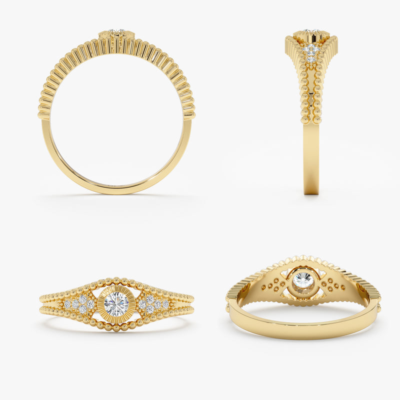 solid gold ring with center diamonds in eye shape design