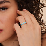 oval cut turquoise stone ring with white diamond halo 