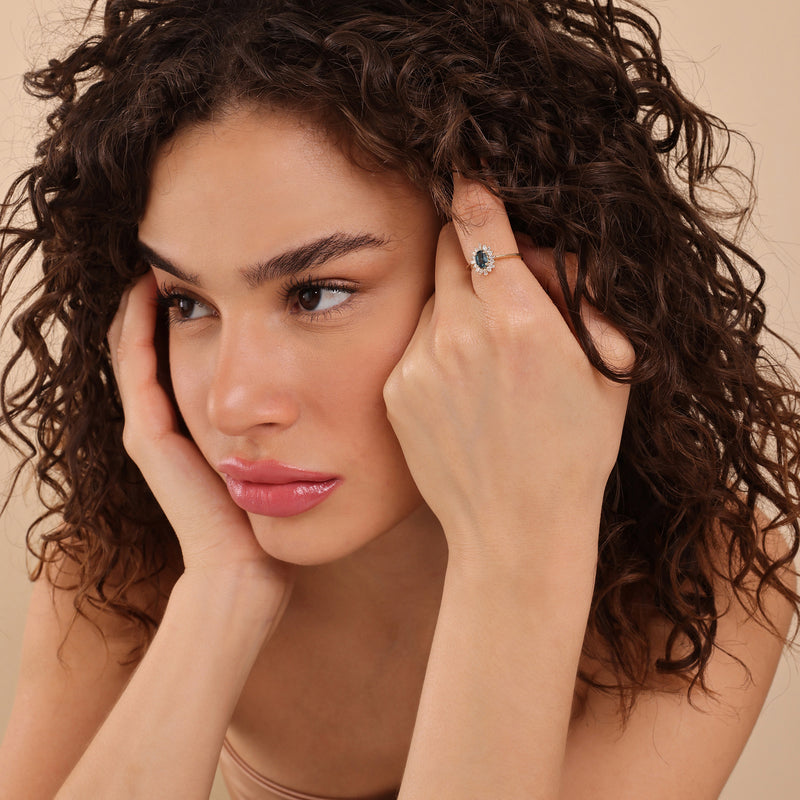 baguette and round diamonds with oval topaz stone