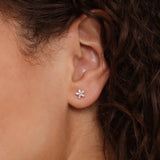 solid gold stud earrings with marquise cut diamonds in flower shape