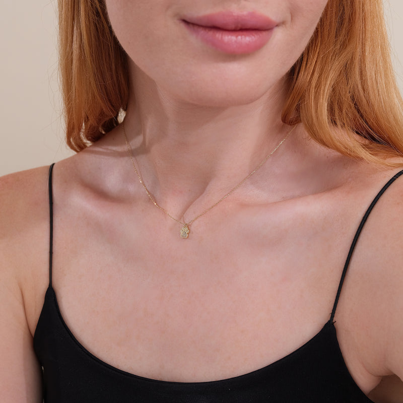dainty paved diamond dog paw pendant with solid gold necklace