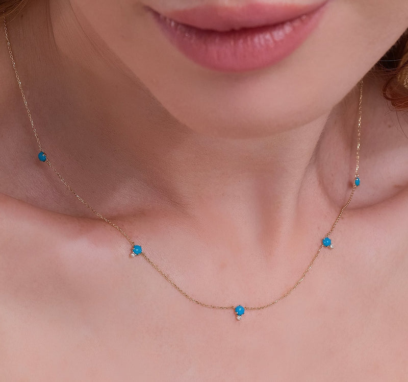 dainty solid gold necklace with multiple station turquoise and diamonds