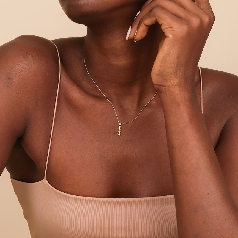 minimalistic diamond bezel bar necklace in solid gold