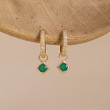 diamond huggies with emerald may birthstone charm in 14k solid gold