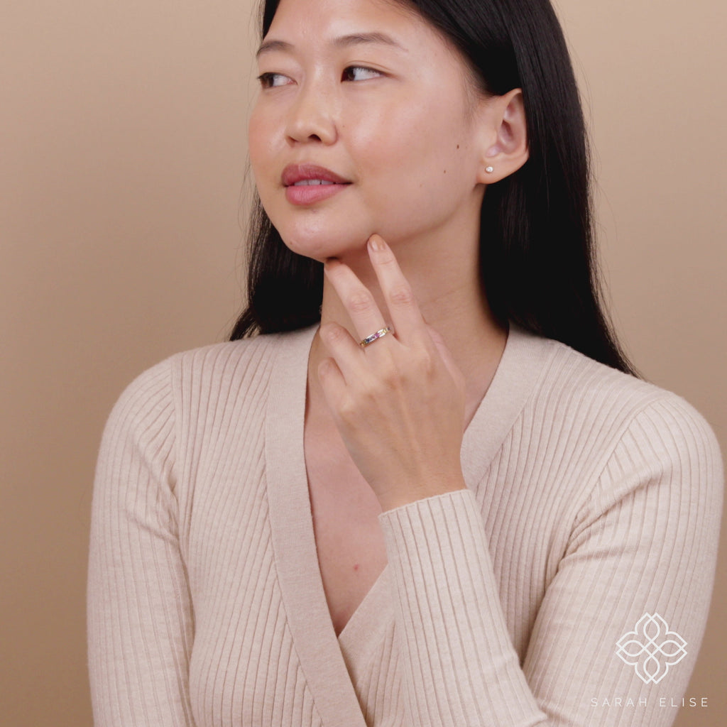 dainty multi color sapphire eternity band in 18k gold