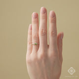 dainty peridot diamond band