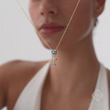 Trilliant Cut Blue Topaz Necklace, Vaelara