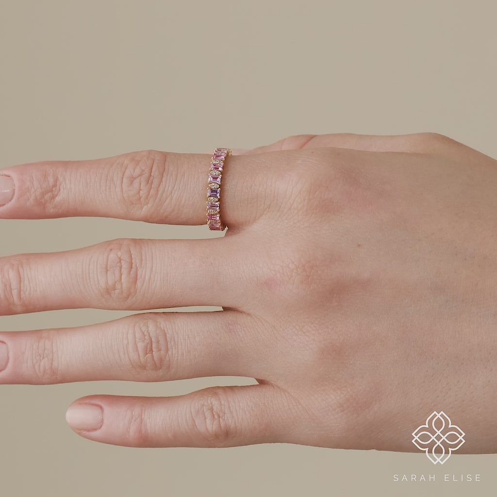 handcrafted, prong set round diamonds and baguette sapphire band