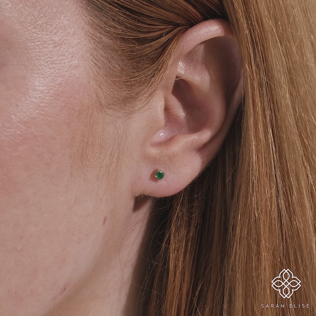 Close up video displaying handmade emerald green studs gift for her. 