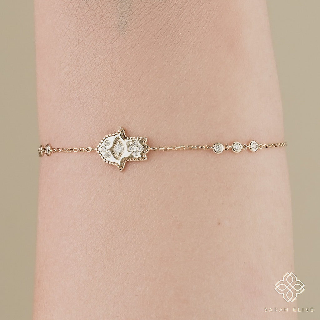 dainty hamsa hand evil eye bracelet 