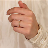 handcrafted gold spacer ring for engagement stack