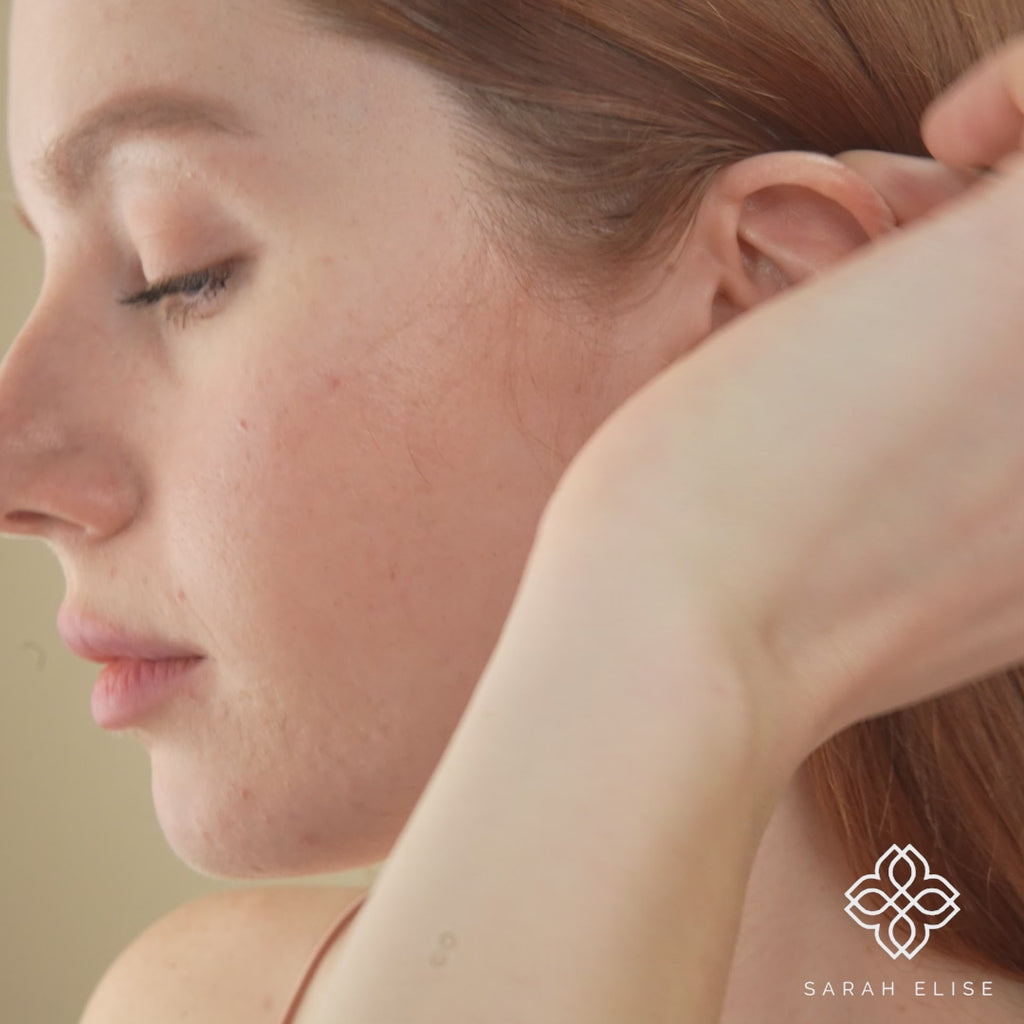 Video close up of stacked baguette diamond earring hoop in 14k solid gold gift for her