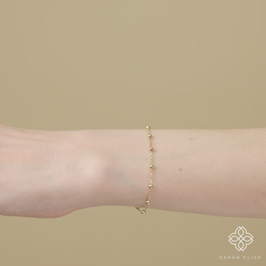 Thin gold bead chain bracelet for a touch of everyday elegance