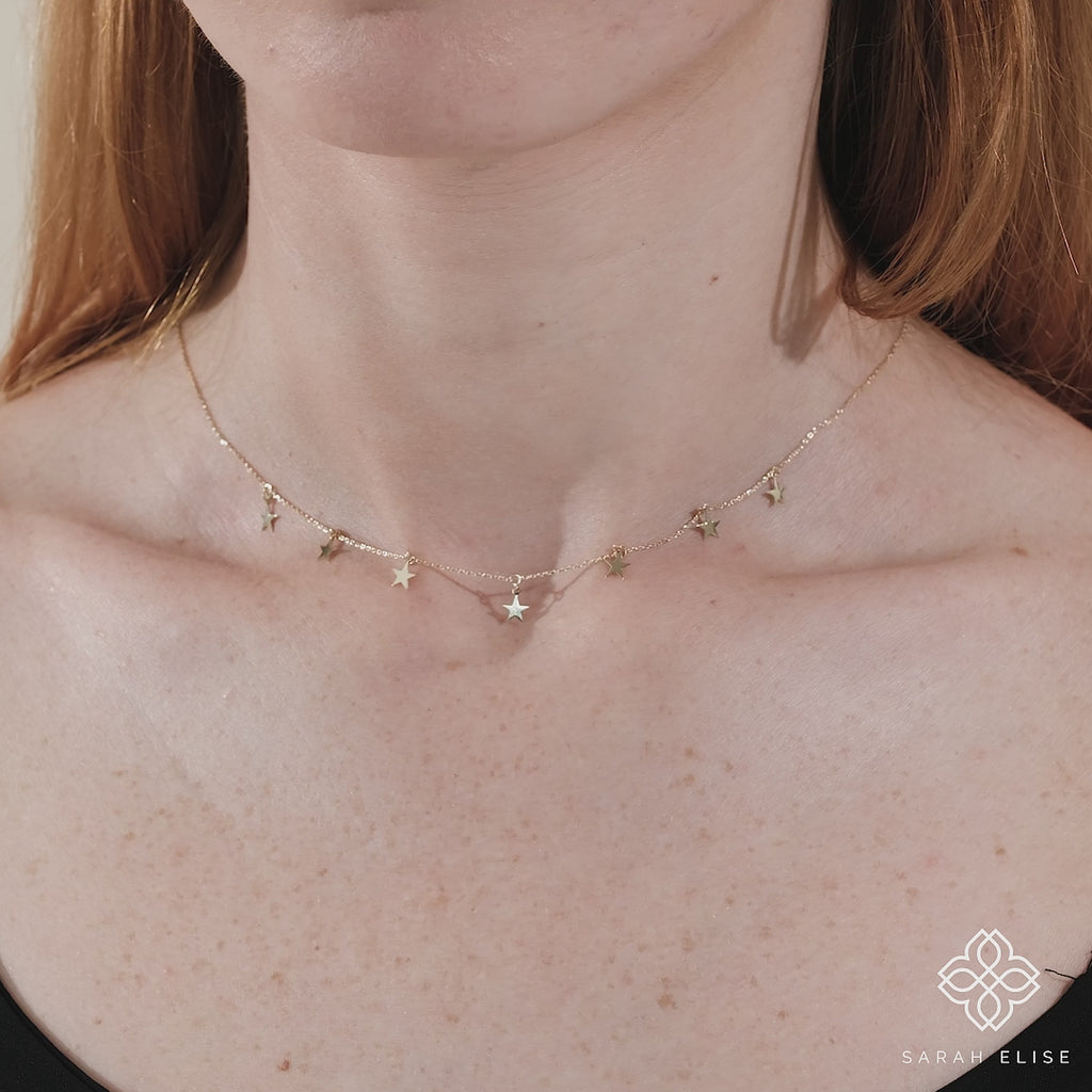 dainty multiple star hanging charm necklace in solid gold for her