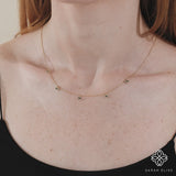 dainty eye charm necklace with diamonds and blue sapphire 