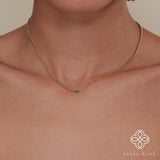 delicate natural green emerald on solid gold chain