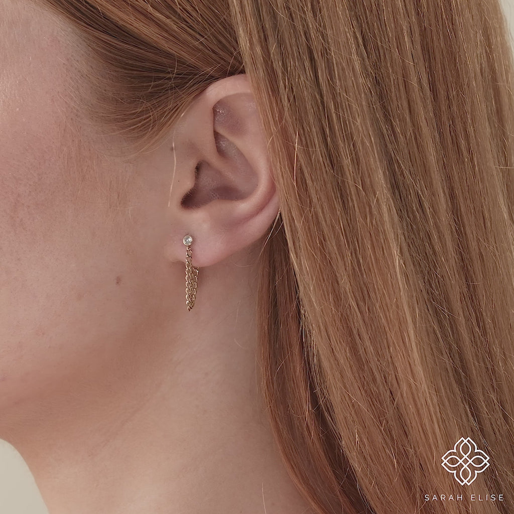 Video close up of handmade diamond stud earring in 14k solid gold with hanging cuban chain gift for her