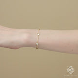 Timeless diamond by the yard bracelet featuring sparkling diamonds and gleaming gold.