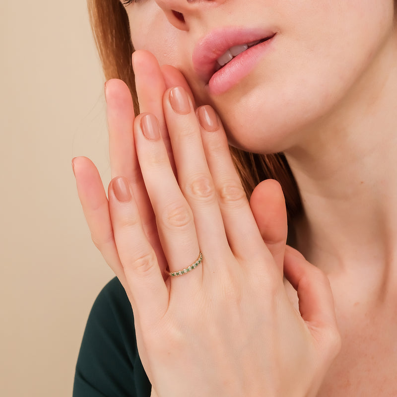 prong set gold diamond emerald ring