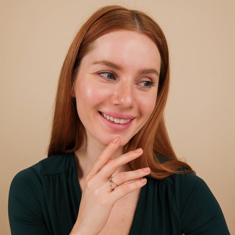 18k pear emerald x ring