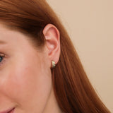 Model wears handmade chunky grosgrain hoop huggie