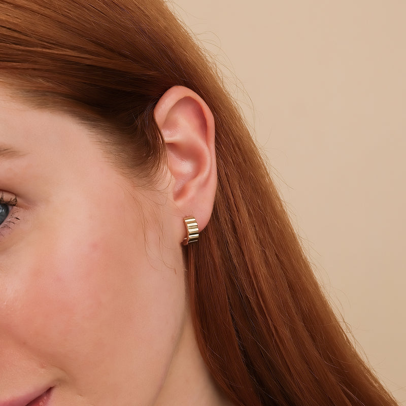 Model wears handmade chunky grosgrain hoop huggie