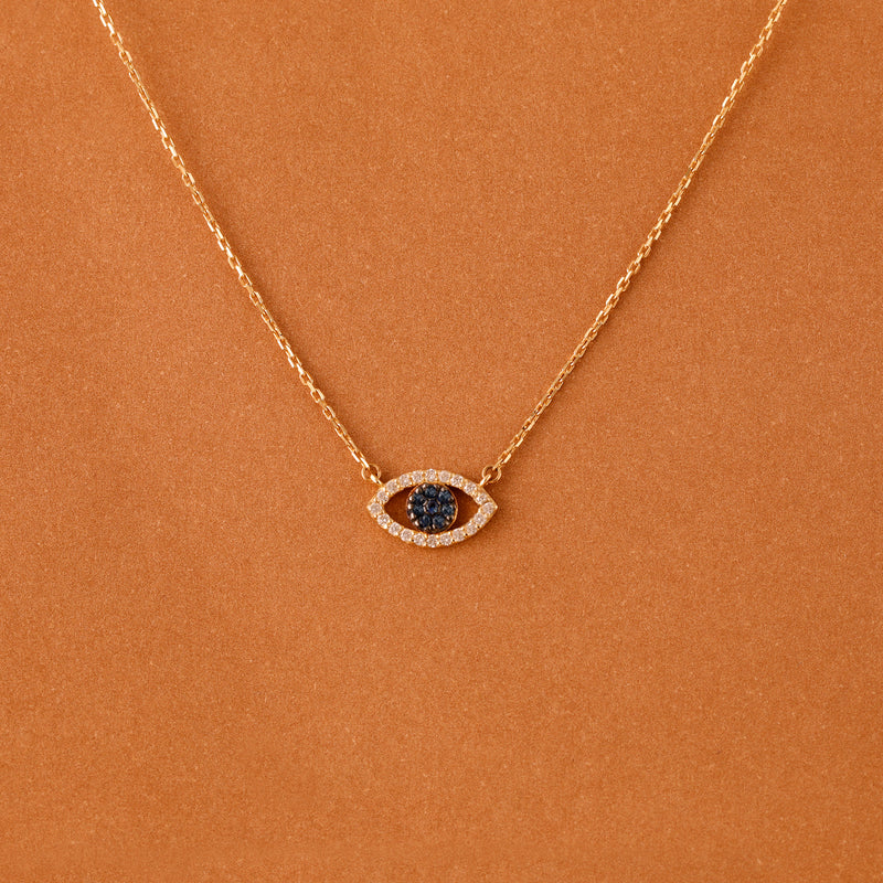 diamond and blue sapphire lucky eye necklace