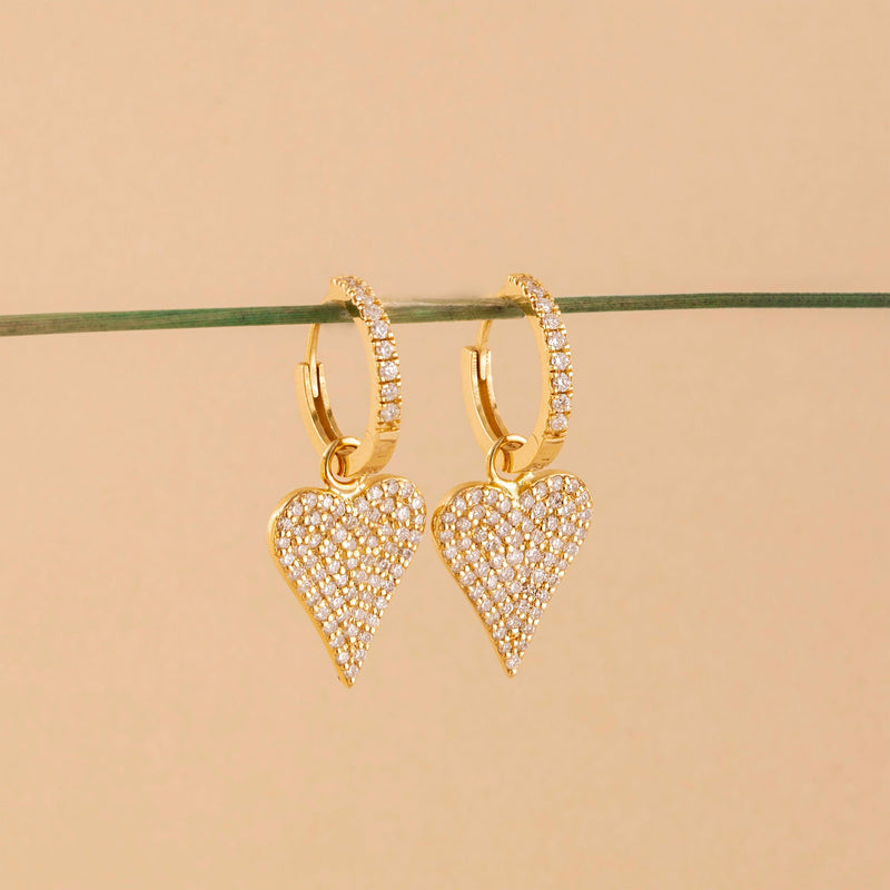 pair of solid 14k yellow gold heart diamond earrings