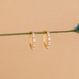 dainty solid Yellow Gold hoops with baguette round Diamond