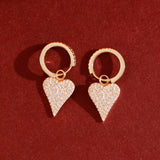 solid gold natural diamond hoop huggies with heart charm
