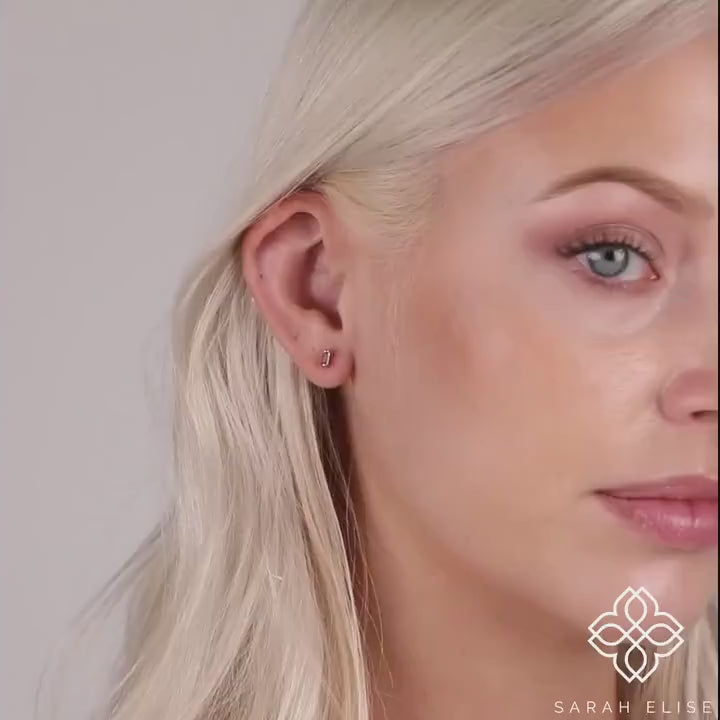 prong set pink sapphire stud for her september birthstone