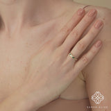 drop shape emeralds with diamond ring