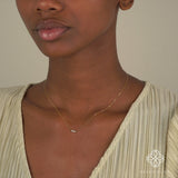 Sapphire Evil Eye necklace in gold