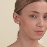 Video of model wearing handmade solid 14k gold eye shape stud with single diamond gift for her