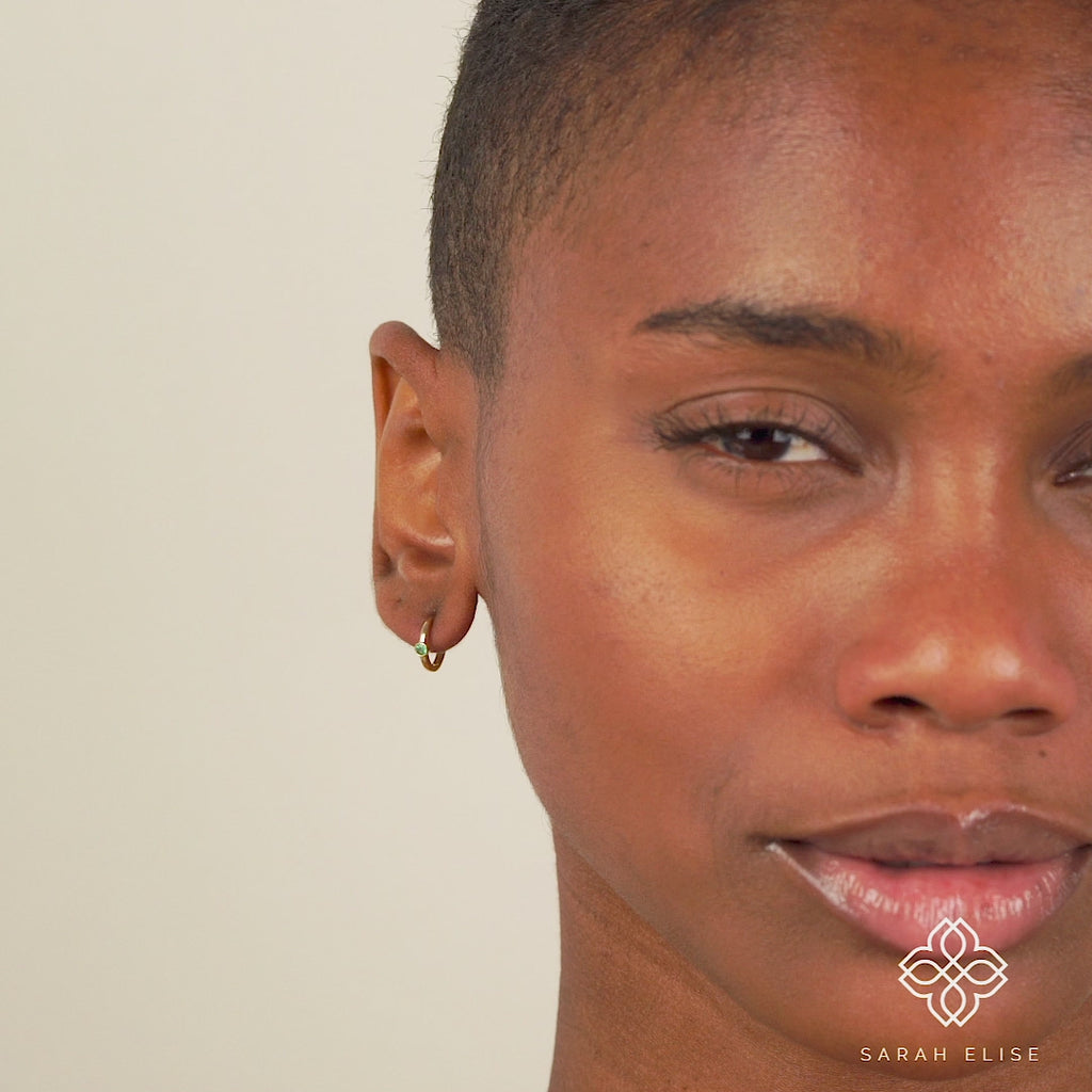 Video close up of Handmade Natural Emerald Huggies