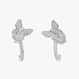 handcrafted pair of solid 14k white gold diamond lined butterfly huggie earring 