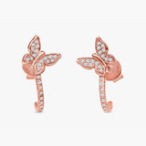 Handcrafted pair of solid 14k rose gold diamond paved butterfly hoop huggie earrings