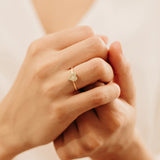 Handmade ring with a single white diamond