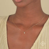 Diamond clover necklace with four diamond petals in gold