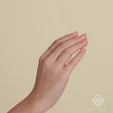 ethically sourced green peridot and white diamond engagement band