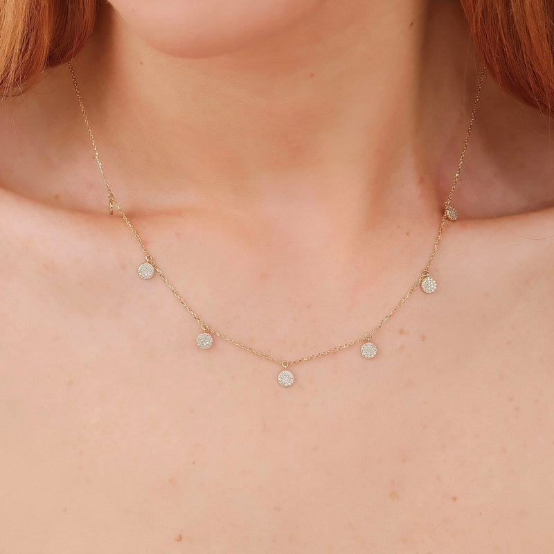 dainty solid gold necklace with diamond paved hanging discs
