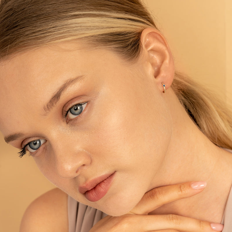 Tiny solid 14k Gold single bezel Blue Sapphire Huggie Earrings