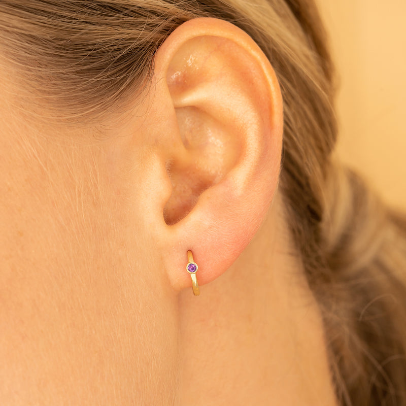 Simplistic Amethyst Huggie hoop for her in solid 14k gold