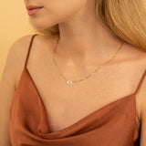 Evil eye pendant chain with diamonds and blue sapphires for her