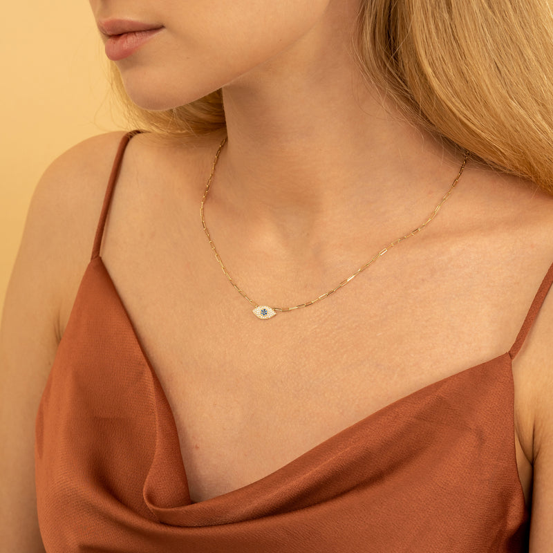 Evil eye pendant chain with diamonds and blue sapphires for her