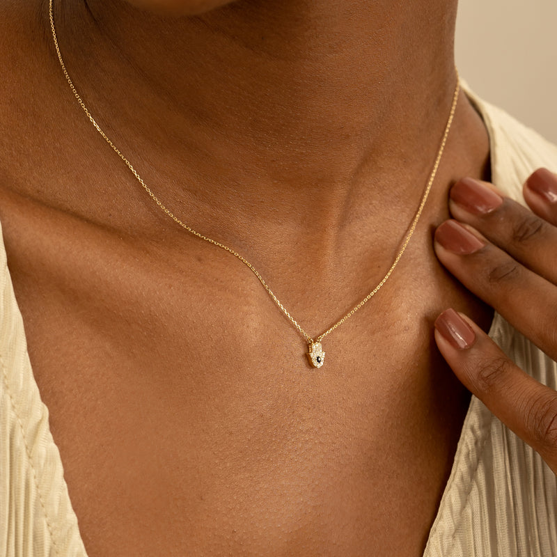 Handcrafted sapphire and diamond Hamsa pendant necklace