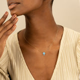 opal cross necklace in  solid gold